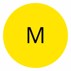 Ein leuchtend gelber Kreis mit dem Buchstaben „M“ in fetter schwarzer Schrift in der Mitte.